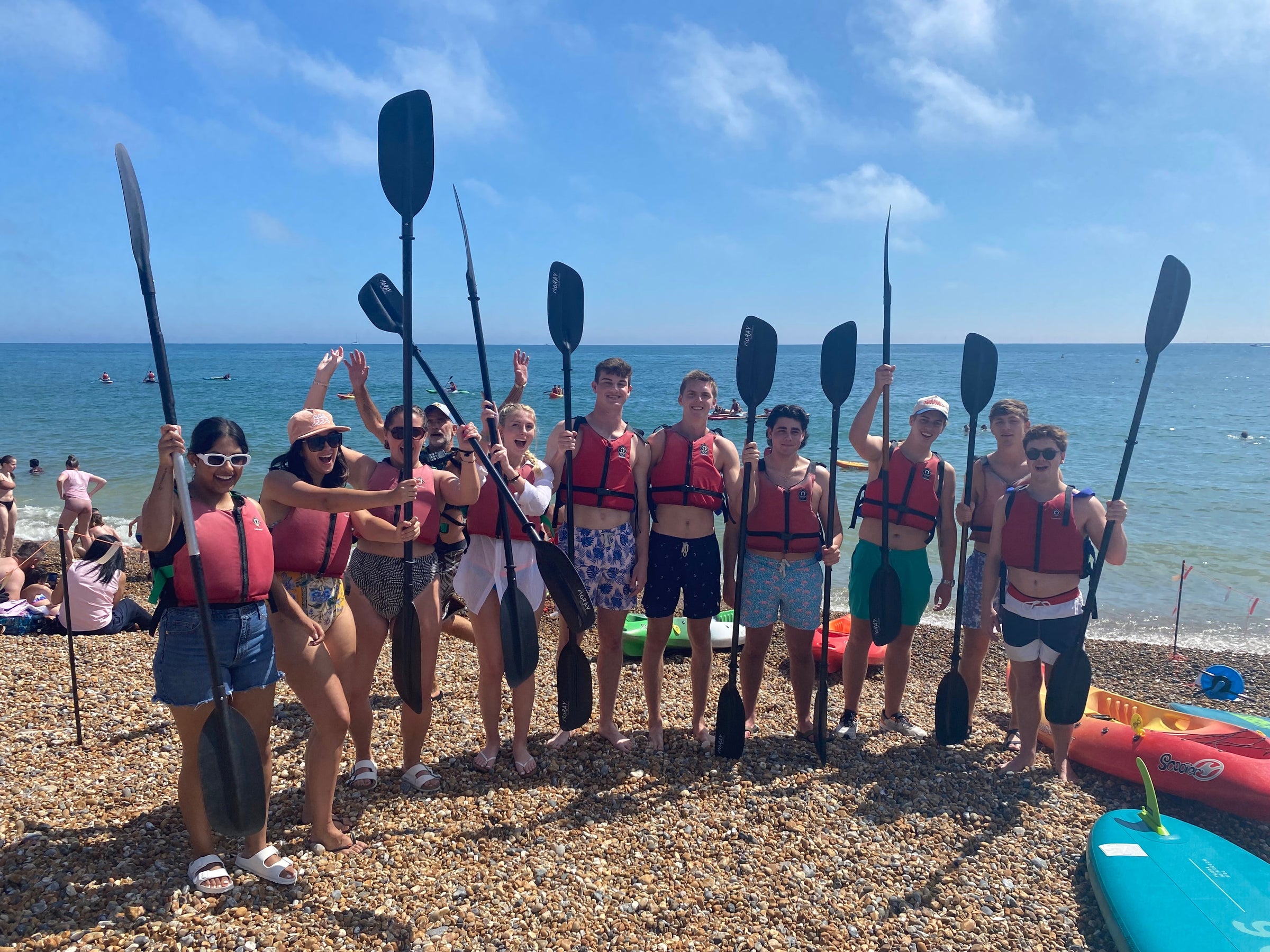 Children enjoying mixed paddlesport fun at Piddinghoe Lake