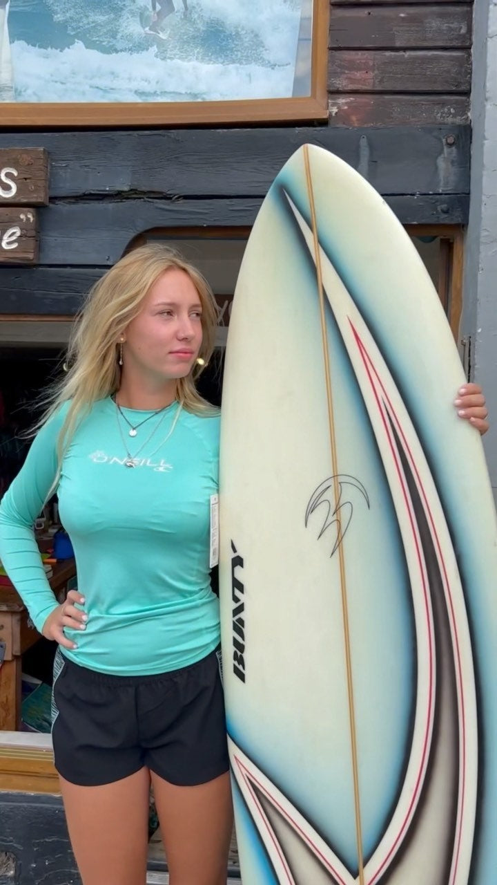 Woman surfing on wave