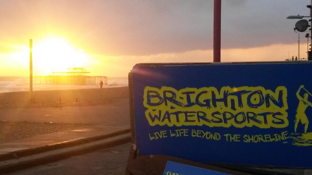 Brighton Sunset and Brighton Watersports sign
